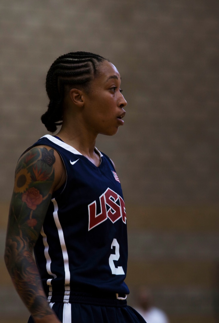 U.S. Army Spc. Vanessa Lamison, a shooting guard on the United States Military Women’s Basketball Team, surveys the court during the United States vs. France game at the Conseil International Du Sport Militaire (CISM) World Military Women’s Basketball Championship July 26 at Camp Pendleton, California. The base is hosting the CISM World Military Women’s Basketball Championship July 25 through July 29 to promote peace activities and solidarity among military athletes through sports. (U.S. Marine Corps photo by Sgt. Abbey Perria)