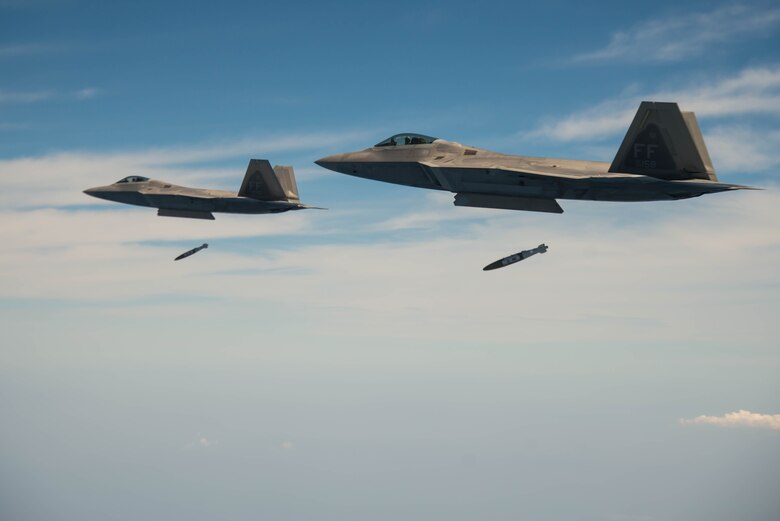 94th Fighter Squadron, F-22A Raptor pilots drop Joint Direct Attack Munitions during the 95th anniversary of Maj. Gen. William “Billy” Mitchell bombing the Ostfriesland at Langley Air Force Base, Va., July 22, 2016. The aircraft that sunk the Ostfriesland 95 years ago took off out of
Langley Field. (U.S. Air Force photo by Staff Sgt. J.D. Strong II)