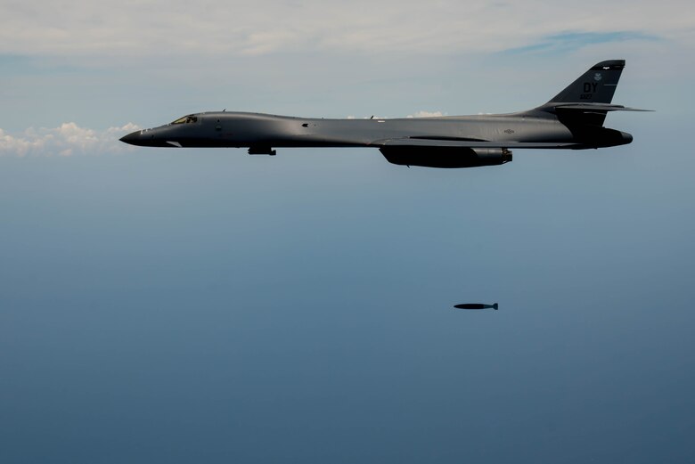 A B-1 Lancer drops Joint Direct Attack Munitions during the 95th anniversary of Maj. Gen. William “Billy” Mitchell bombing the Ostfriesland at Langley Air Force Base, Va., July 22, 2016. The B-1 Lancer carries the largest payload of both guided and unguided weapons in the Air Force inventory. (U.S. Air Force photo by Staff Sgt. J.D. Strong II)