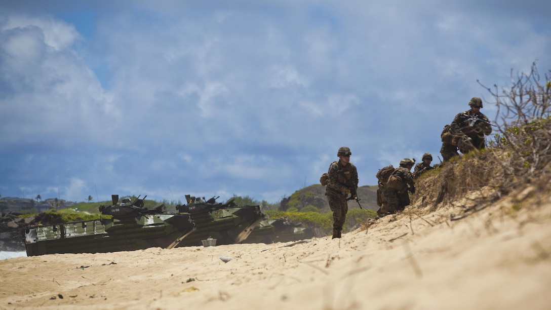U.S. Marines assigned to 2nd Battalion, 3rd Marine Regiment, run along the beach during an amphibious demonstration showing the interoperability between the U.S. military and partnered nations participating in Rim of the Pacific Exercise at Pyramid Rock Beach, Marine Corps Base Hawaii, July 14, 2016. Twenty-six nations, 49 ships, six submarines, about 200 aircraft, and 25,000 personnel are participating in RIMPAC 16 from June 29 to Aug. 4 in and around the Hawaiian Islands and Southern California. The world's largest international maritime exercise, RIMPAC provides a unique training opportunity while fostering and sustaining cooperative relationships between participants critical to ensuring the safety of sea lanes and security on the world's oceans. RIMPAC 16 is the 25th exercise in the series that began in 1971.