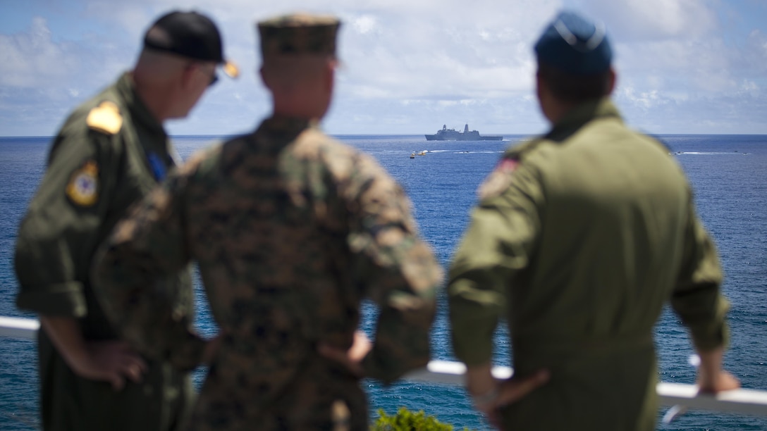 U.S. and foreign military leaders watch as the USS San Diego floats off the coast of Pyramid Rock Beach during an amphibious demonstration showing the interoperability between the U.S. military and partnered nations participating in Rim of the Pacific Exercise at Marine Corps Base Hawaii, Hawaii, July 14, 2016. Twenty-six nations, 49 ships, six submarines, about 200 aircraft, and 25,000 personnel are participating in RIMPAC 16 from June 29 to Aug. 4 in and around the Hawaiian Islands and Southern California. The world's largest international maritime exercise, RIMPAC provides a unique training opportunity while fostering and sustaining cooperative relationships between participants critical to ensuring the safety of sea lanes and security on the world's oceans. RIMPAC 16 is the 25th exercise in the series that began in 1971. 