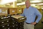 Steve Essex,  the inactive/active records officer for the New York Army National Guard Military Personnel Office with the index cards which indicate which former National Guard Soldiers have paper records stored by the New York State Archives on Monday, July 18, 2016. Essex accesses records dating back to 1945 to assist former National Guard Soldiers in finding their state service records.  