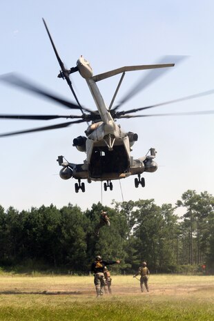 Marines with U.S. Marine Corps Forces Special Operations Command complete a fast rope and rappelling course on Landing Zone Parrot at Marine Corps Base Camp Lejeune, N.C., July 20, 2016. The exercise was a part of a two weeklong Helicopter Insertion and Extraction Techniques Course. The CH-53 provided for the training evolution was assigned to Marine Heavy Helicopter Squadron 461, 2nd Marine Aircraft Wing. (U.S. Marine Corps photo by Lance Cpl. Mackenzie Gibson/Released)