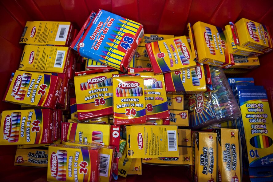 Crayons and colored pencils sit in a bin during the Back to School Brigade, July 27, 2016, at Moody Air Force Base, Ga. The local community provided more than 75 backpacks and various school supplies for Moody’s school age children. (U.S. Air Force photo by Airman 1st Class Janiqua P. Robinson)