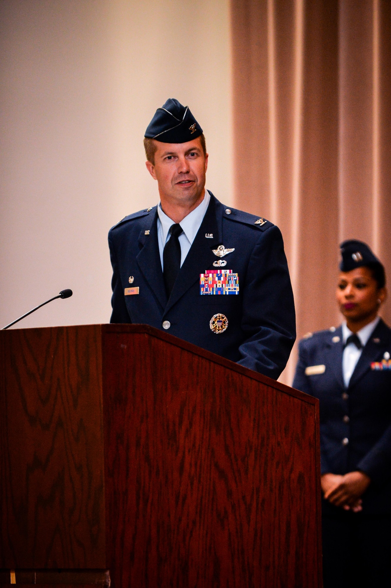 Col. Ty Neuman, 2nd Bomb Wing commander, addresses the 2nd Medical Group during a change of command ceremony at Barksdale Air Force Base, La., July 22, 2016. The 2nd MDG provides essential services for more than 30,000 eligible beneficiaries in the area, including service members and their families, Department of Defense civilians and retirees. (U.S. Air Force photo/Senior Airman Mozer O. Da Cunha)