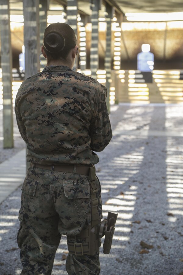 U.S. Marine Corps Sgt. Lauren J. Fiero, a team leader assigned to the Female Engagement Team, 22nd Marine Expeditionary Unit (MEU), participates in a pistol qualification course at Camp Lejeune, N.C., April 26, 2016. Marines with the 22nd MEU participated in a course of fire for pistol qualification in order to improve and maintain combat readiness.