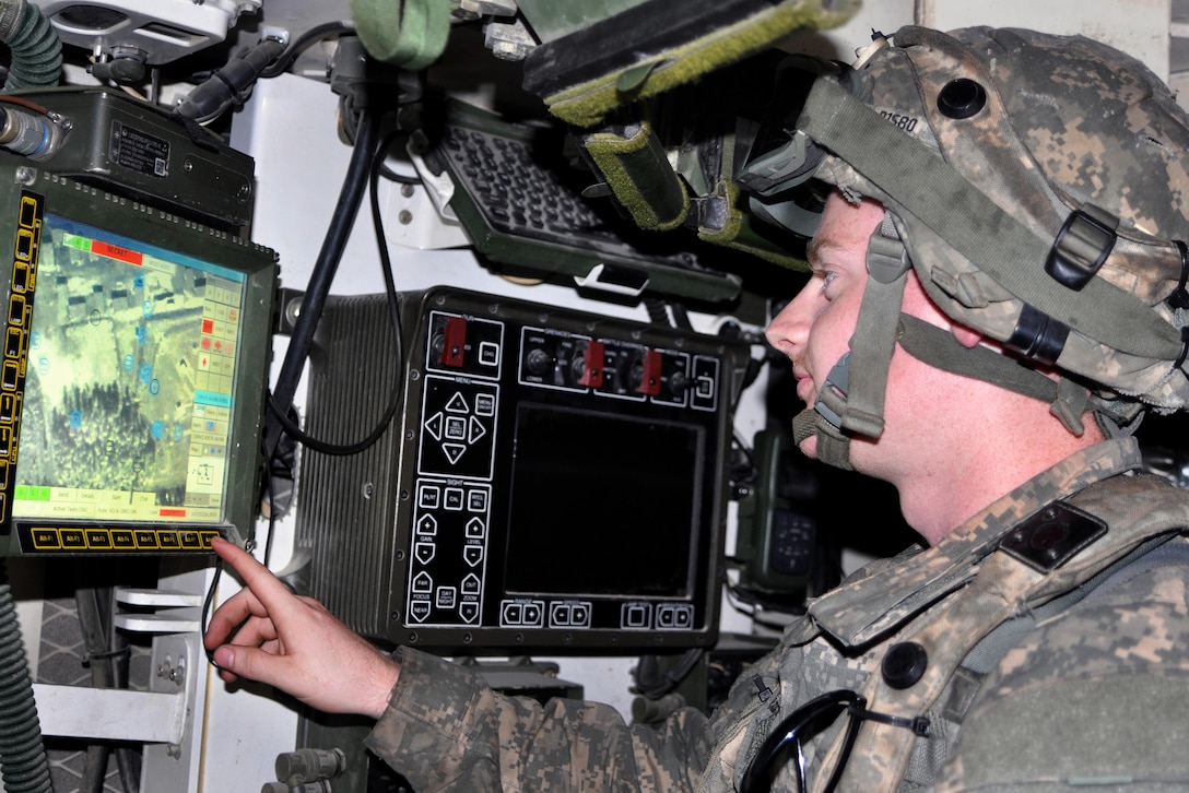 Army Spc. Nathan Penwell checks equipment inside his M1126 Stryker combat vehicle during training at the Joint Readiness Training Center in Fort Polk, La., July 17, 2016. Penwell is a driver assigned to the Pennsylvania Army National Guard’s Company A, 1st Battalion, 112th Stryker Brigade Combat Team. Army National Guard photo by Sgt. Maj. Corine Lombardo