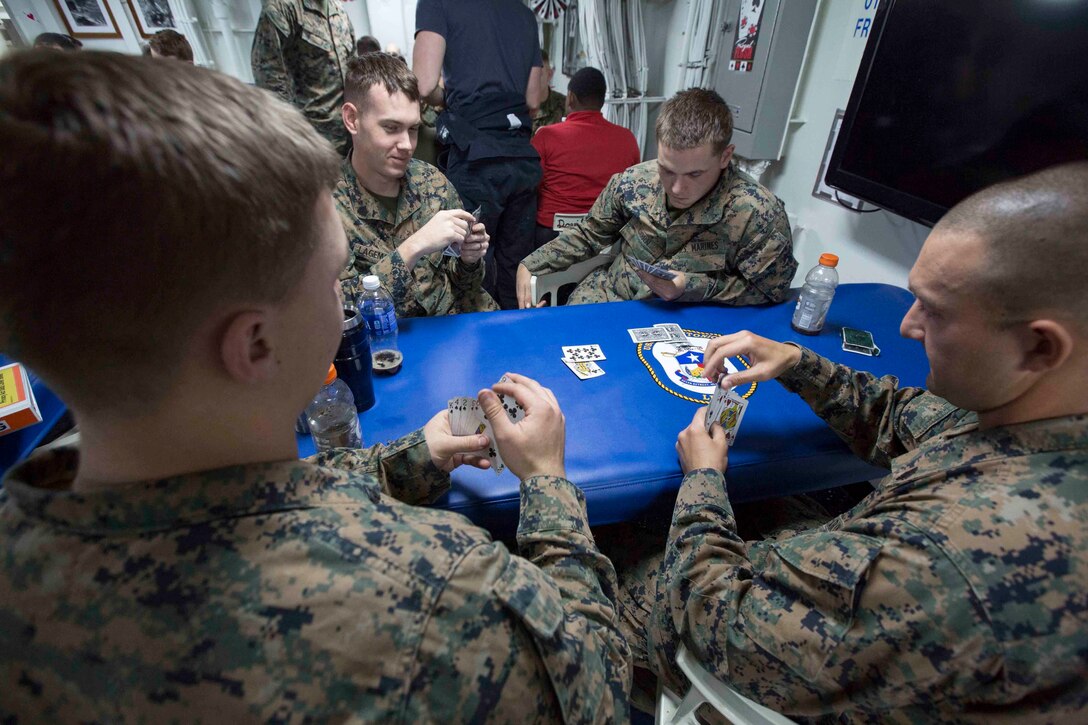 Marines and Sailors aboard the USS San Antonio (LPD-17) enjoyed a night of blackjack, poker and spades April 10, 2016. The servicemembers, from the 22nd Marine Expeditionary Unit and Amphibious Squadron Six (PHIBRON-6), are underway for Amphibious Ready Group/MEU exercises. 