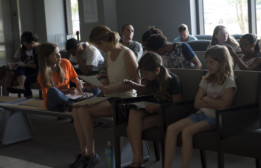 Joint Base Langley-Eustis community members wait for their appointments during the physical day hosted at U.S. Air Force Hospital Langley at Langley Air Force Base, Va., July 20, 2016. The 633rd Medical Operations Squadron pediatric and family health clinics partnered to provide school and sports physicals for children ages four to 18 years old. (U.S. Air Force photo by Airman 1st Class Kaylee Dubois)