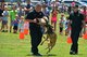 Sumter City Police Department officers performs a K-9 demonstration during the Exceptional Family Member Program Kid’s Jamboree at Shaw Air Force Base, S.C., July 27, 2016. The event provided Team Shaw families the opportunity to receive school supplies, play in bounce houses and receive standard health screenings before the beginning of the school year. (U.S. Air Force photo by Airman 1st Class Christopher Maldonado)