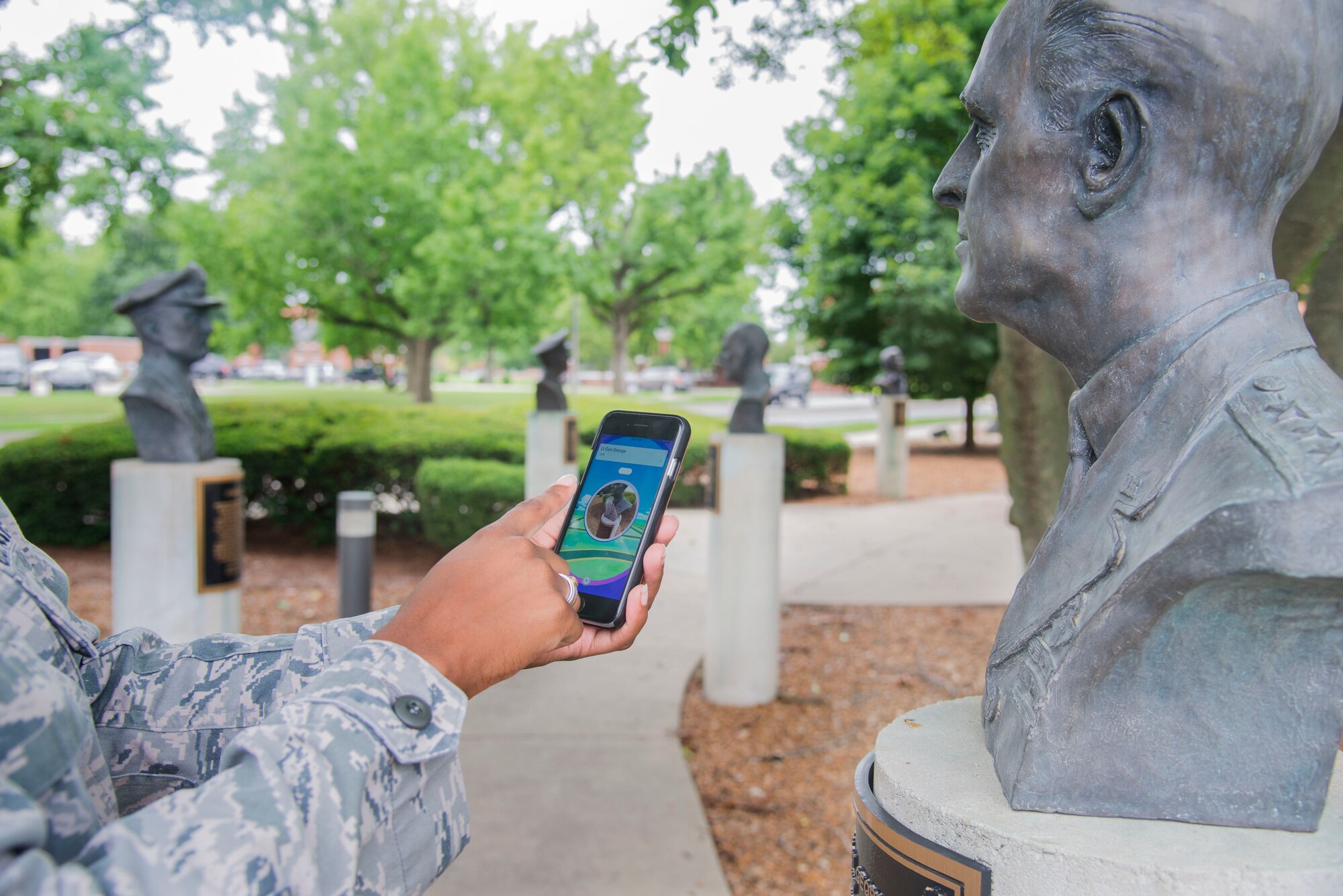 An Airman activates a Pokestop on the phone app Pokemon Go at Scott Air Force Base, Illinois on July 26, 2016. The app released on July 6, 2016 in North America and has been downloaded by over 75 million people worldwide. (U.S Air Force Photo by Airman Daniel Garcia)