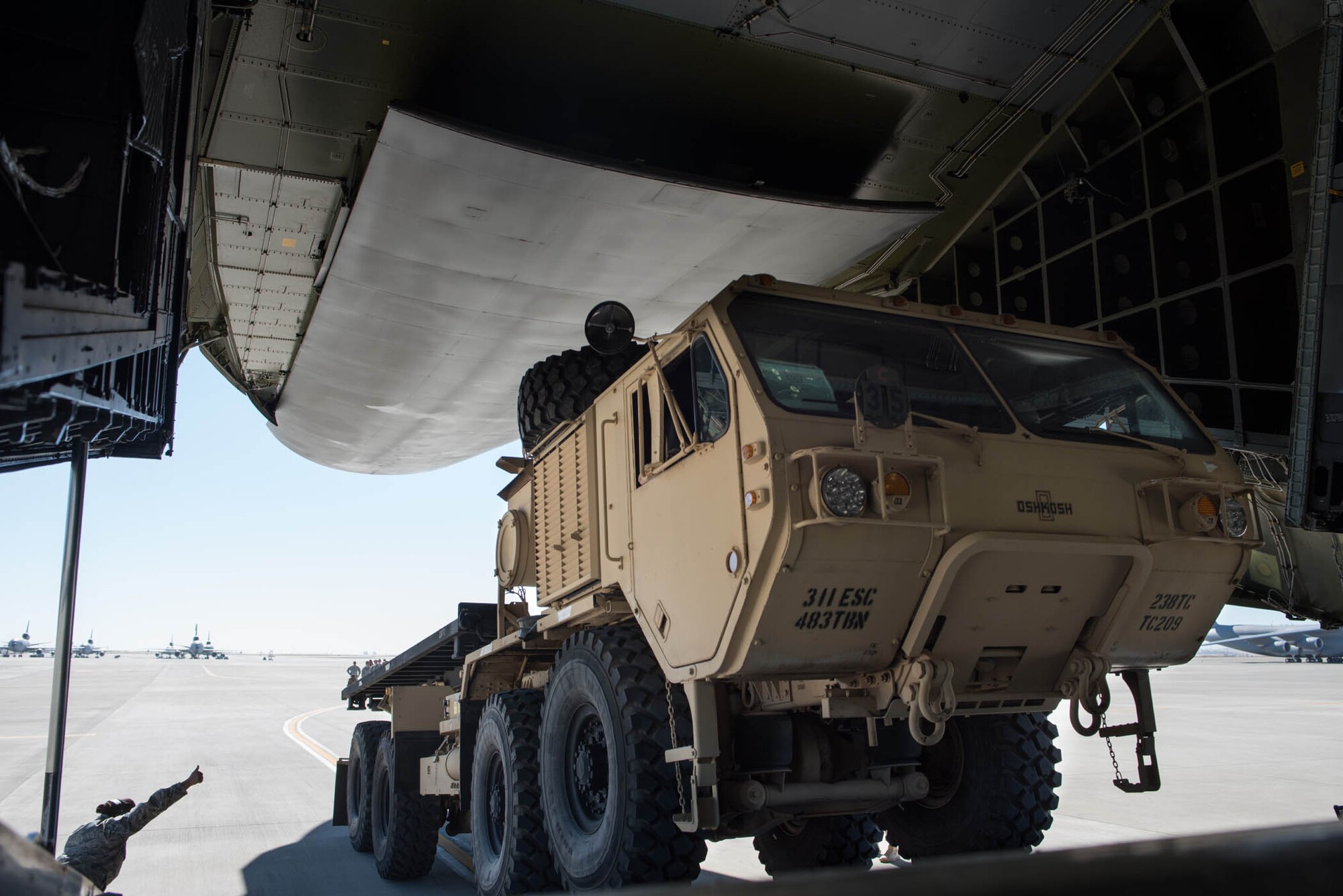 An Army Reserve load handling system enters a C-5M Super Galaxy at Travis Air Force base, Calif., during Exercise Patriot Wyvern. Reservists from the 349th Air Mobility Wing and the 238th Transportation Company joined forces July 23, 2016 to share air transportation skills during the joint training event. The exercise which involved multiple active duty, Air Force Reserve and Army Reserve units, helped Airmen and Soldiers hone their job skills and learn how to work efficiently together under difficult circumstances. The 238th TC is stationed at nearby Military Ocean Terminal Concord (U.S. Air Force photo by Ken Wright)