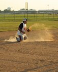 Guillermo Herrera, Air Force Global Strike Command softball team shortstop, snags a line drive in the bottom of the sixth inning at Barksdale Air Force Base, La., July 21, 2016. The defensive play wasn’t enough to stop the 2nd Maintenance Squadron softball team from scoring three more runs that inning. (U.S. Air Force photo/Airman 1st Class Stuart Bright)
