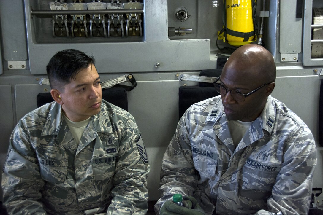 Chaplain Lemuel Bellows, 349th Air Mobility Wing, talks with Master Sgt. Richard Giles, 349th Medical Squadron bio-medical technician during Exercise Patriot Wyvern, July 23,2016 at Travis Air Force Base, Calif.
Giles portrayed a sexually assaulted patient on board a C-17 Globemaster III.
The 349th Aeromedical Staging Squadron, 349th Medical Squadron and the 349th Aeromedical Evacuation Squadron practiced in-flight emergency and evacuation processes during the training event at Travis Air Force base, Calif.
Patriot Wyvern is a hands-on, bi-annual event conducted by the 349th AMW, and designed to hone combat skills and improve organizational interoperability. (U.S. Air Force photo by Senior Airman Sajjan Singh)
