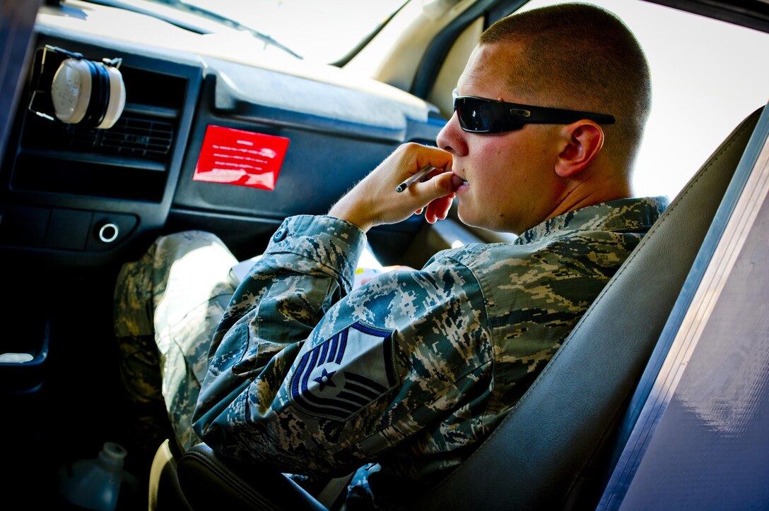 Master Sgt. Michael Paterson, 926th Aircraft Maintenance Squadron flightline expeditor, gathers thoughts to himself during Red Flag 16-3, July 13, 2016 at Nellis Air Force Base, Nev. Flightline expeditors engage key responsibilities, and ensure crew chiefs are assigned at the appropriate levels of mission requirements and acknowledge that aircrafts continue to produce airpower. (U.S. Air Force photo/Senior Airman Brett Clashman)
