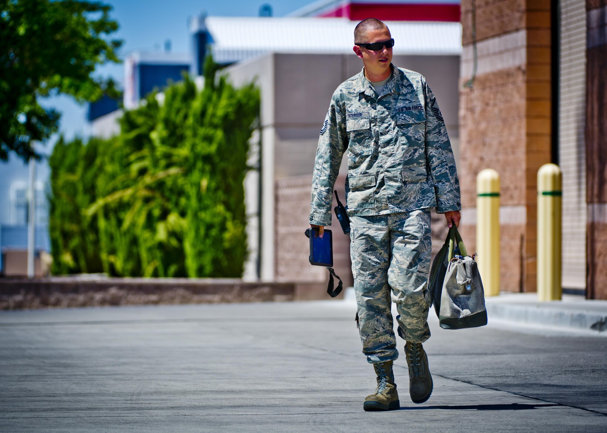 Master Sgt. Michael Paterson, 926th Aircraft Maintenance Squadron flightline expeditor, walks out to the flightline during Red Flag 16-3, July 13, 2016 at Nellis Air Force Base, Nev. Red Flag is a realistic combat training exercise involving the air forces of the U.S. and its allies that maximizes the combat readiness and survivability of participants by providing a realistic training environment. (U.S. Air Force photo/Senior Airman Brett Clashman)