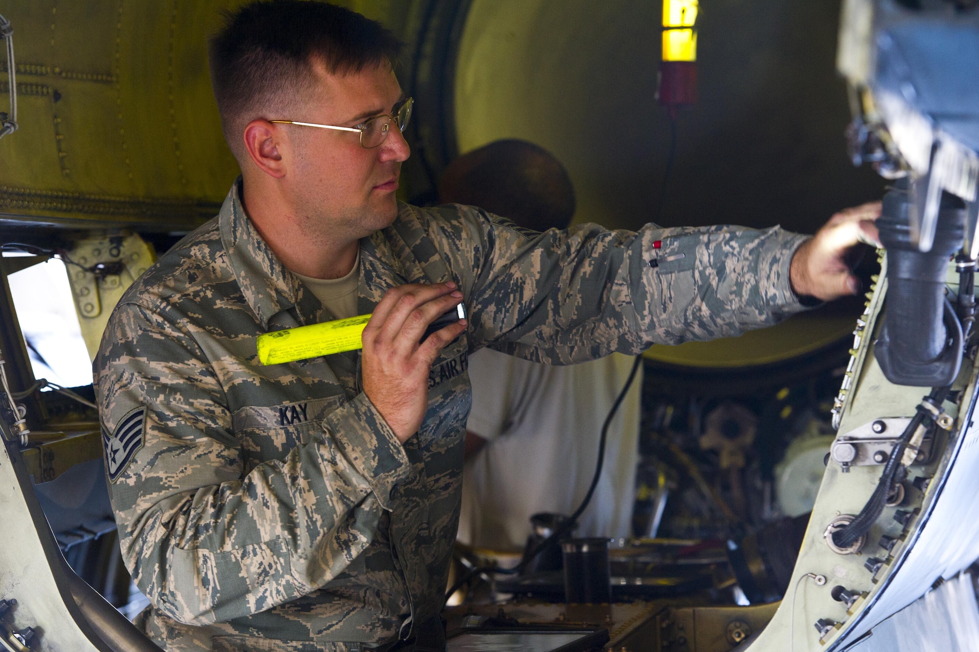 Staff Sgt. Brian Kay, 926th Aircraft Maintenance Squadron crew chief, performs a service inspection on an F-16 Fighting Falcon assigned to the 64th Aggressor’s Squadron during Red Flag 16-3, July 13, 2016 at Nellis Air Force Base, Nev. the 64th AGRS will test other unit’s capabilities in air-to-air combat while acting as the “enemy” in the exercise.