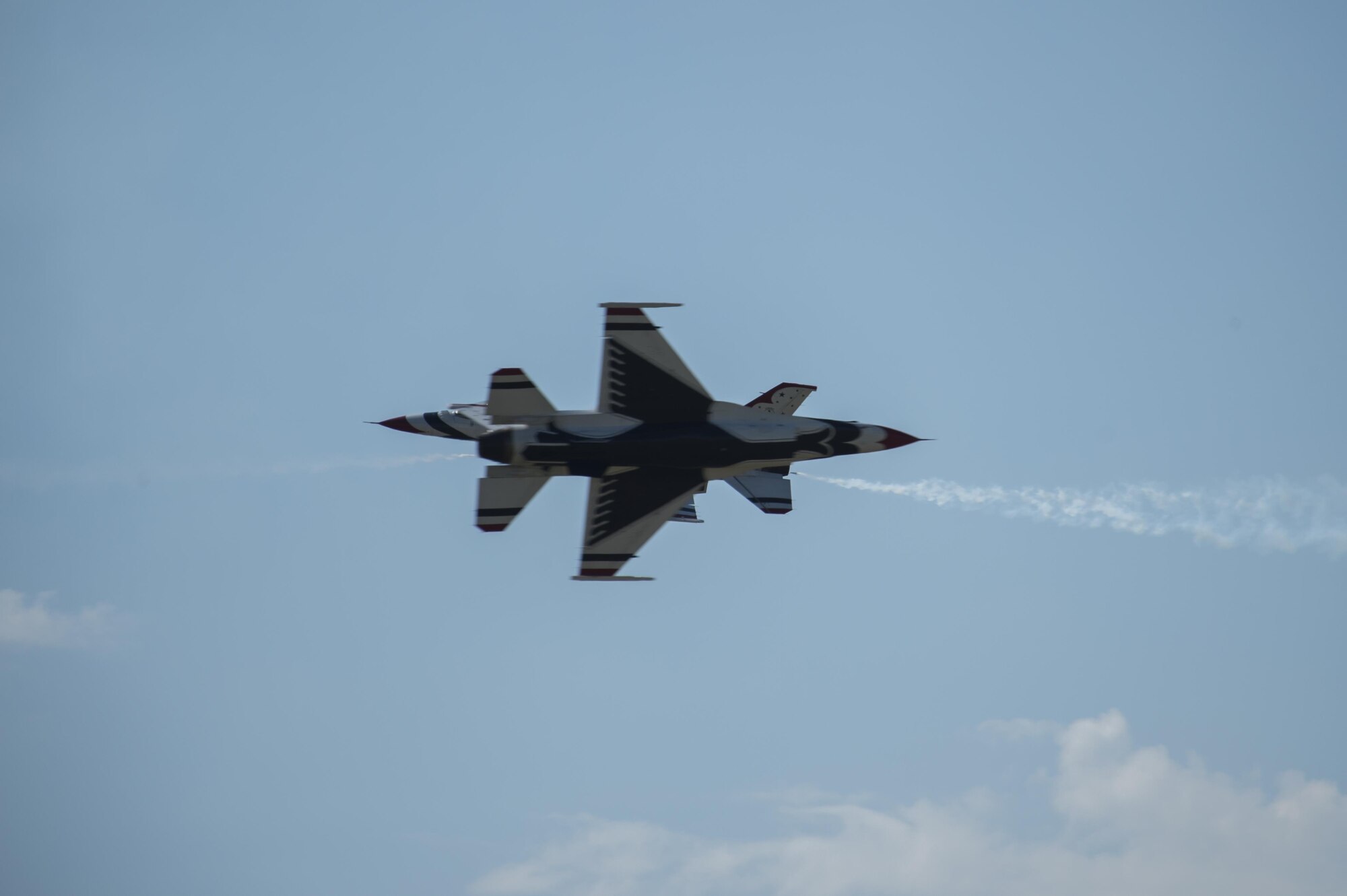 The U.S. Air Force Thunderbirds perform an opposing knife edge pass during Cheyenne Frontier Days, July 27, 2016, in Cheyenne, Wyo. The Thunderbirds are an Air Combat Command unit composed of eight pilots, including six demonstration pilots, four support officers, three civilians and more than 130 enlisted personnel performing in 25 career fields. (U.S. Air Force photo by Staff Sgt. Christopher Ruano)