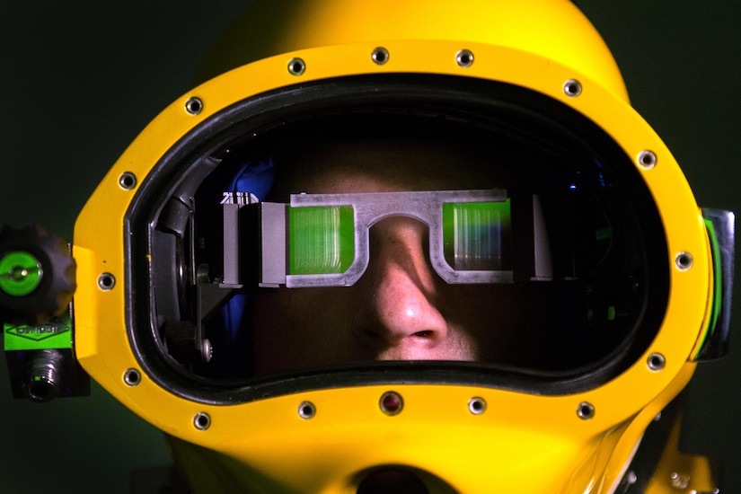 A Marine wears a prototype dive helmet with the Diver Augmented Vision Display at the Naval Surface Warfare Center Panama City Division, Naval Support Activity Panama City in Panama City, Fla., July 14, 2016. DoD photo by EJ Hersom