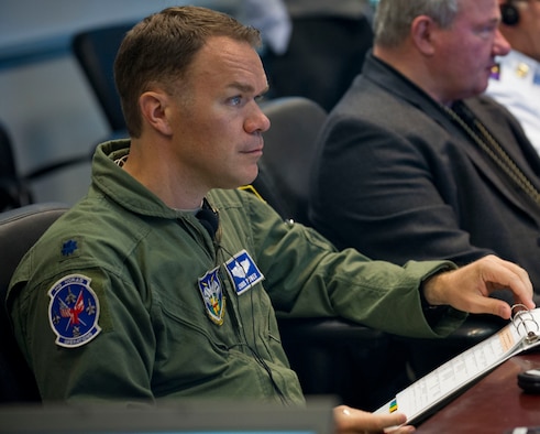 Air Force Lt. Col. Chris Power, the deputy division chief of North American Aerospace Defense Command operations support, takes part in the Amalgam Eagle 16 tactical exercise between the United States and Mexico, in Colorado Springs, Colo., July 27, 2016. The three-day exercise was aimed at strengthening information sharing and cooperation in response to a simulation of an illicit cross-border flight. DoD photo by Lisa Ferdinando