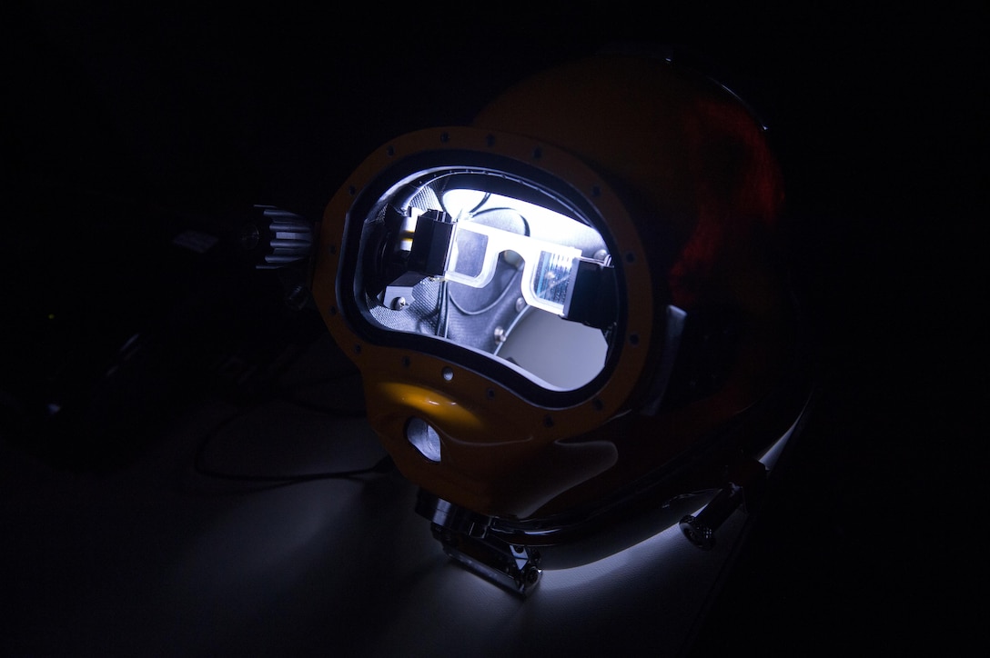A light illuminates a prototype dive helmet with the Diver Augmented Vision Display at the Naval Surface Warfare Center Panama City Division at the Naval Support Activity Panama City in Panama City, Fla., July 14, 2016. DoD photo by EJ Hersom