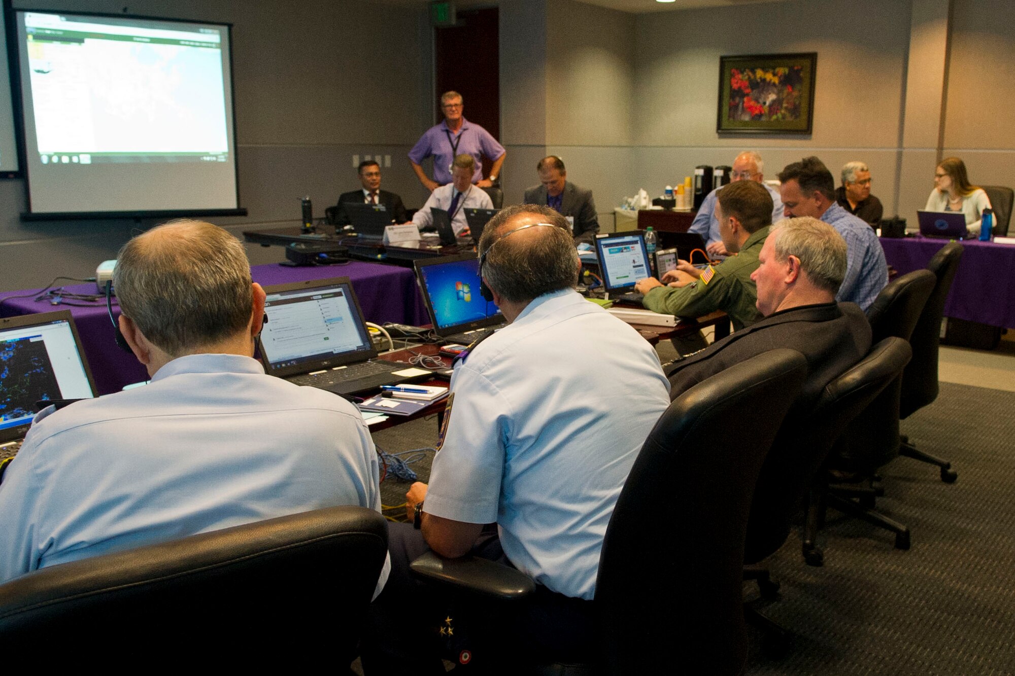 Participants from North American Aerospace Defense Command and U.S. Northern Command and the Mexican air force take part in the Amalgam Eagle 16 tactical exercise between the United States and Mexico in Colorado Springs, Colo., July 27, 2016. The three-day exercise was aimed at strengthening information sharing and cooperation in response to a simulation of an illicit cross-border flight. DoD photo by Lisa Ferdinando