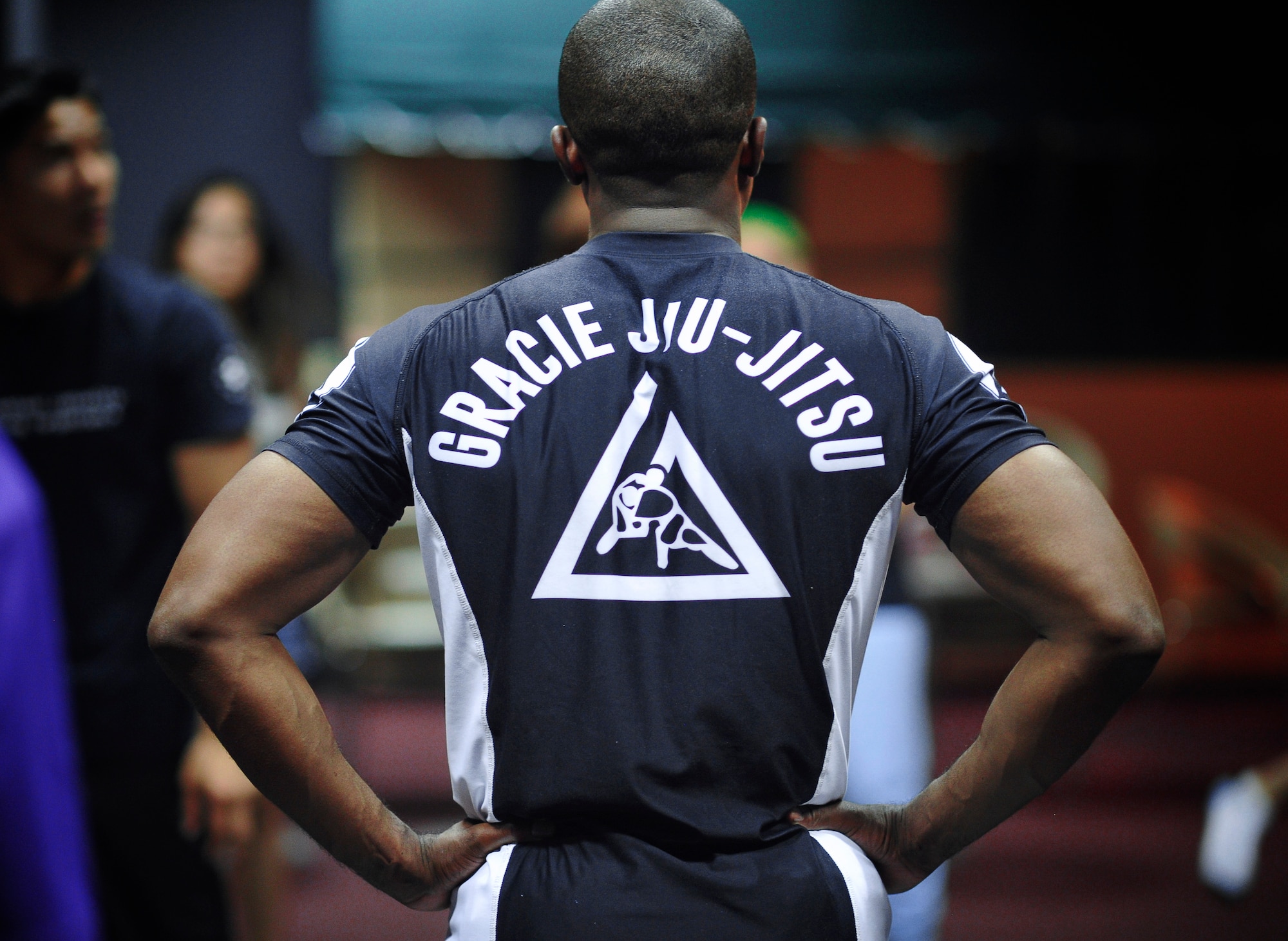 Maj. Tyrone Bess, 374th Security Forces Squadron commander, watches over participants as they practice self-defense techniques during a Gracie Jiu-Jitsu Defense Systems course at Yokota Air Base, Japan, July 23, 2016. In Late August, 2016, Yokota’s own Gracie Defense System program will offer 10, one-hour classes to everyone on base. (U.S. Air Force photo by Senior Airman Delano Scott/Released) 