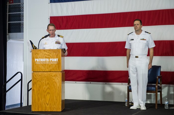 U.S. Navy Capt. Robert Hudson, Naval Support Activity Charleston commander, talks to servicemembers from Joint Base Charleston, S.C., during a change of command ceremony, July 21, 2016 aboard the USS Yorktown, Charleston, S.C. Hudson previously served as the Nuclear Power Training Unit Charleston commander. (U.S. Air Force photo/Staff Sgt. Jared Trimarchi) 