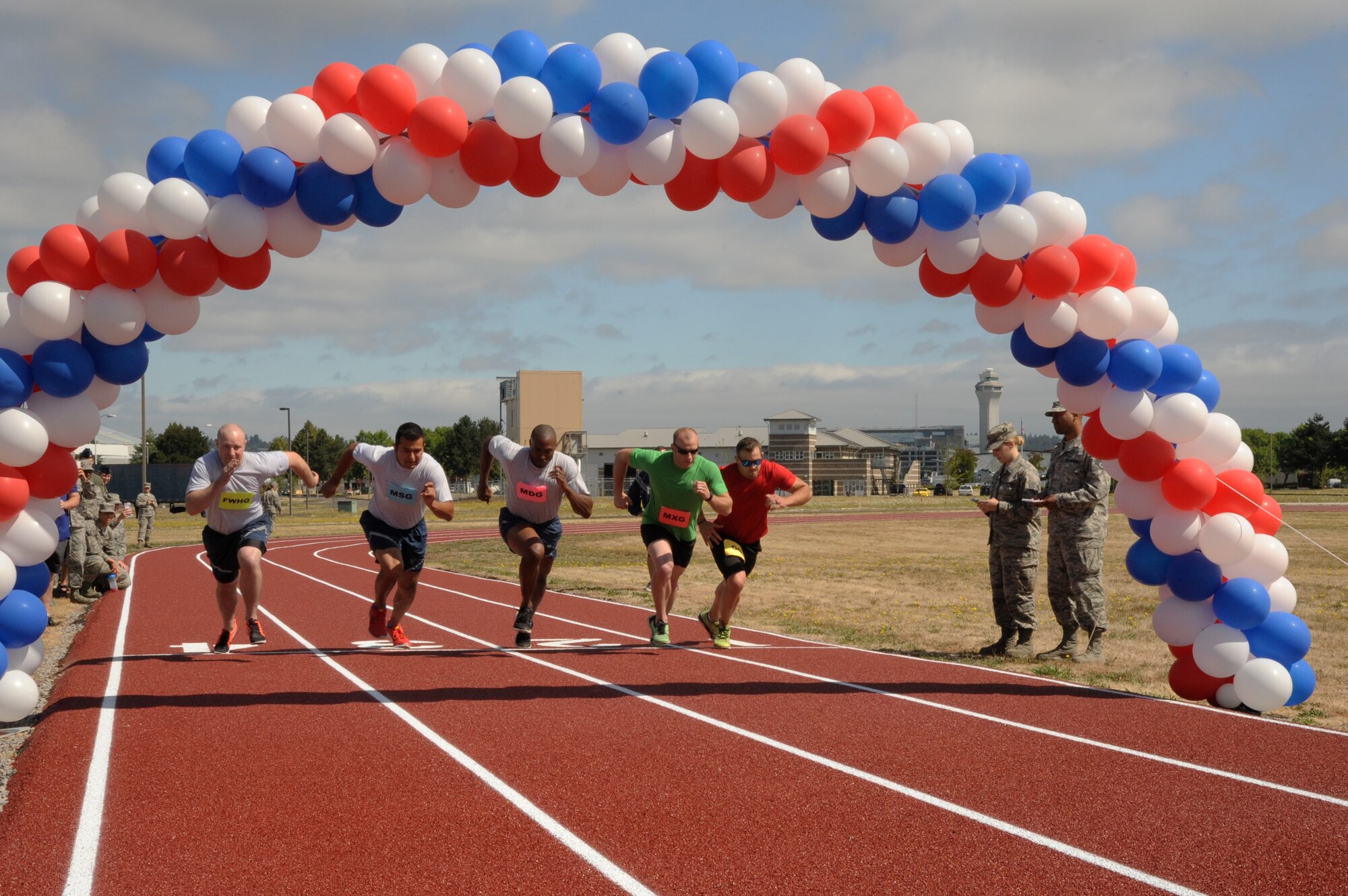Airmen from the 142nd Fighter Wing take off with the starting line at the new track at the Portland Air National Guard Base, Ore., July 26, 2016, during an inaugural first race. From left to right are Staff Sgt. Andrew Hensely, Senior Airman Christopher Alesko, Staff Sgt. Breland Reed, Staff Sgt. Alan Plank and Tech. Sgt. Justin Comfort. (U.S. Air National Guard photo by Tech. Sgt. John Hughel, 142nd Fighter Wing Public Affairs/Released)
