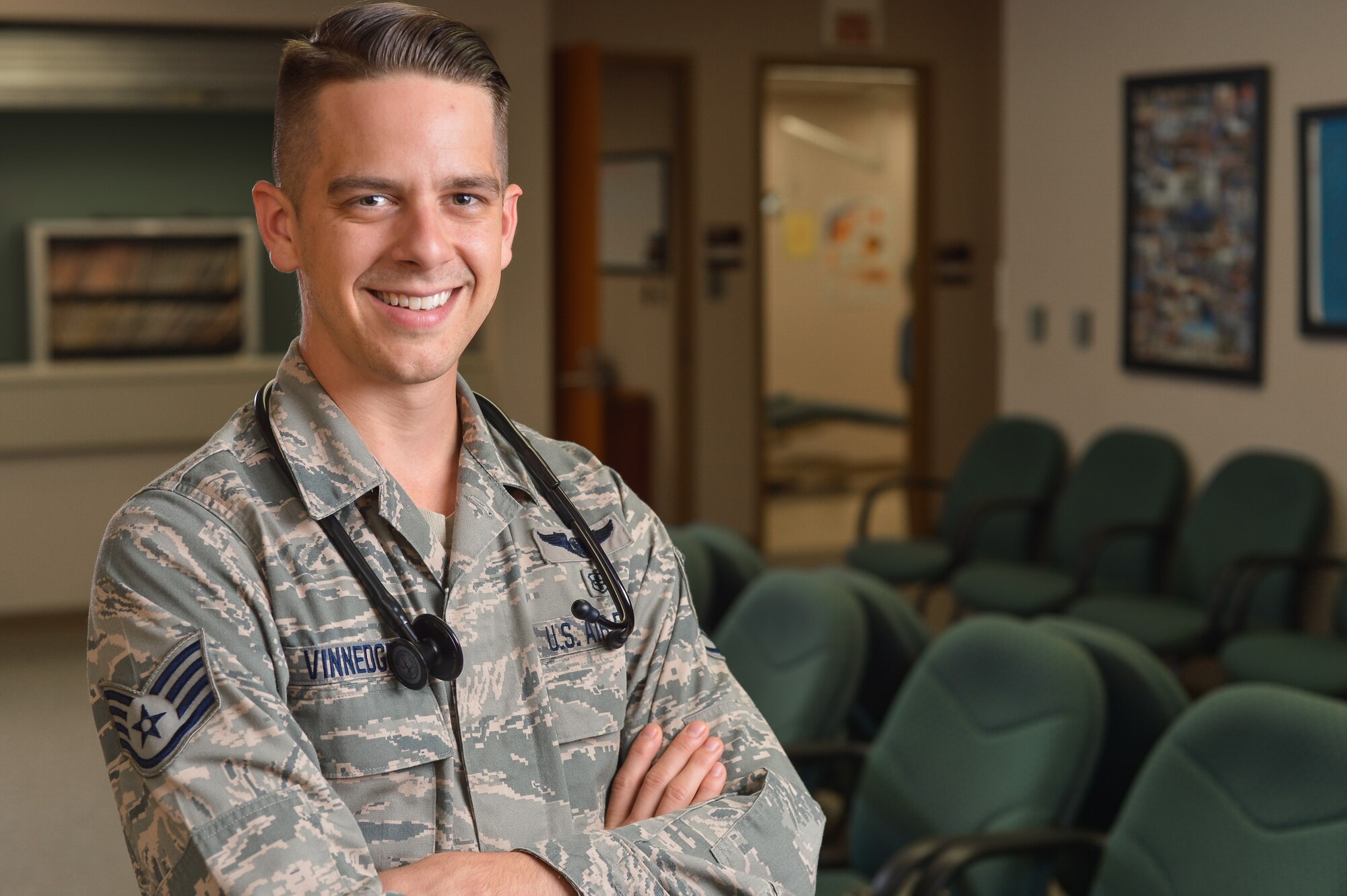 Staff Sgt. Jay Vinnedge stands in the waiting room of the 137th Medical Group clinic at Will Rogers Air National Guard Base in Oklahoma City, June 9, 2016. Vinnedge was one of about 60 U.S. students to be named as a 2016 Tillman Scholar and scholarship recipient. (U.S. Air National Guard photo by Senior Airman Tyler Woodward/Released)