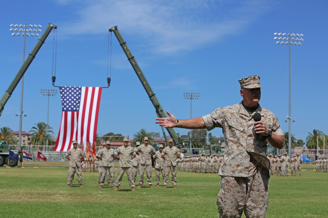Gen. Robert Neller, commandant of the Marine Corps, speaks to Marines, Sailors and families in attendance during a change of command ceremony at Camp Pendleton July 27, 2016. "He's made the Marine Corps a better warfighting organization, which at the end of the day is what we're all about," said Neller. "We can go help people and rescue them, to defeat our nation's enemies, and that's what we do. We assure our friends and deter our adversaries."  During the ceremony, Lt. Gen. David H. Berger relinquished his duties as the commanding general of I MEF to Lt. Gen. Lewis A. Craparotta. (U.S. Marine Corps photo by Cpl. Garrett White/ RELEASED)
