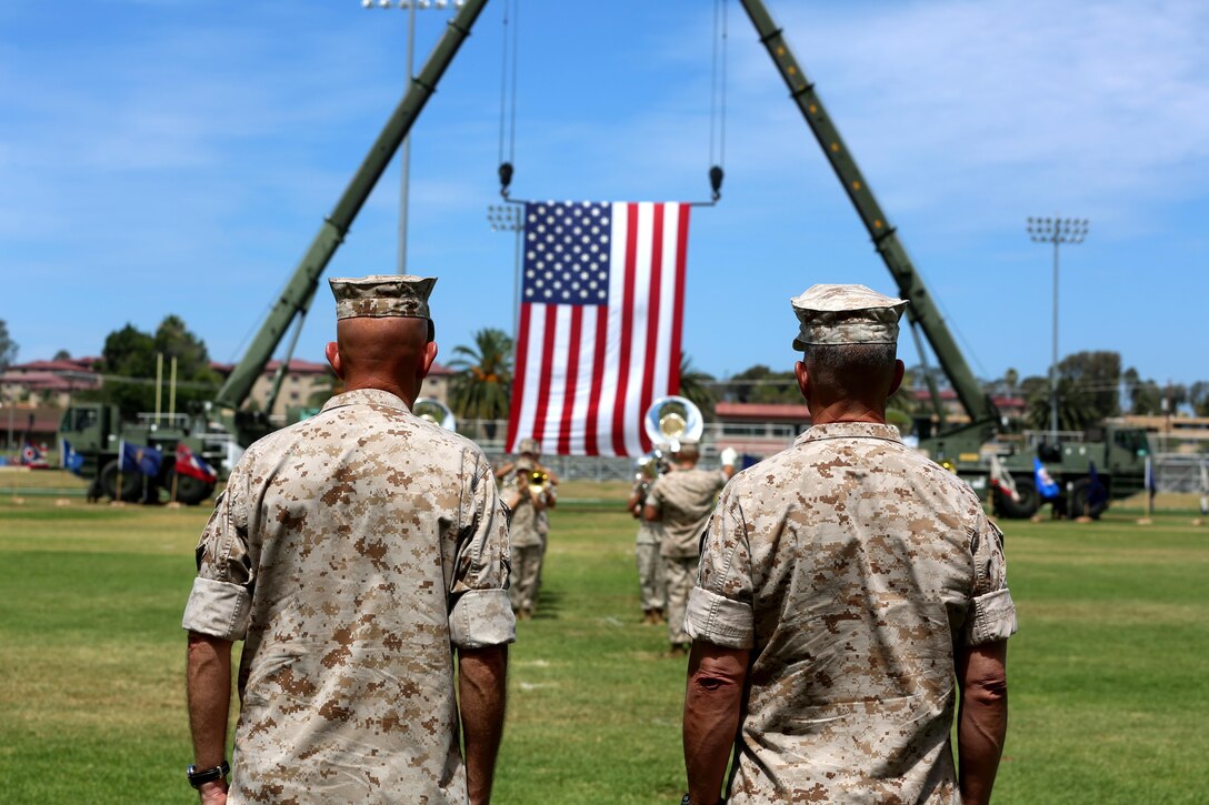 Lt. Gen. Lewis A. Craparotta, the incoming commanding general of I Marine Expeditionary Force and Lt. Gen. David H. Berger, the outgoing commanding general of I MEF, stand at attention during a change of command ceremony at Camp Pendleton July 27, 2016.  During the ceremony, Berger relinquished his duties as the commanding general of I MEF to Craparotta. (U.S. Marine Corps photo by Cpl. Garrett White/ RELEASED)