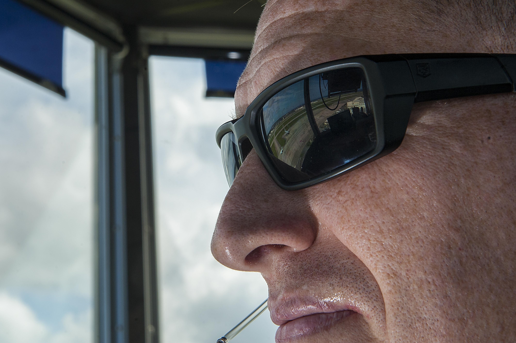 U.S. Air Force Master Sgt. Lance Petrie, 18th Operations Support Squadron NCO in charge of air traffic control training, monitors the flightline July 21, 2016, at Kadena Air Base, Japan. Air traffic controllers undergo extensive training to ensure proper flight operations for different airframes. (U.S. Air Force photo by Airman 1st Class Lynette M. Rolen) 