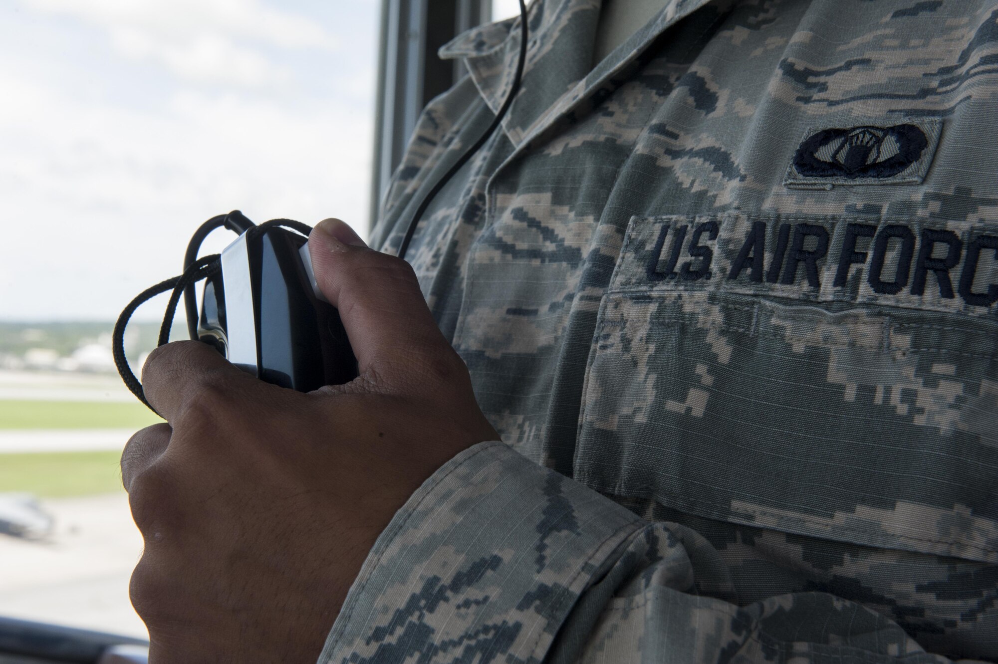 U.S. Air Force Senior Airman Richard Delgado, 18th Operations Support Squadron air traffic controller, speaks with a pilot July 21, 2016, at Kadena Air Base, Japan. Kadena’s multiple airframes and many missions require constant communication between pilots and ATC Airmen to operate safely. (U.S. Air Force photo by Airman 1st Class Lynette M. Rolen)