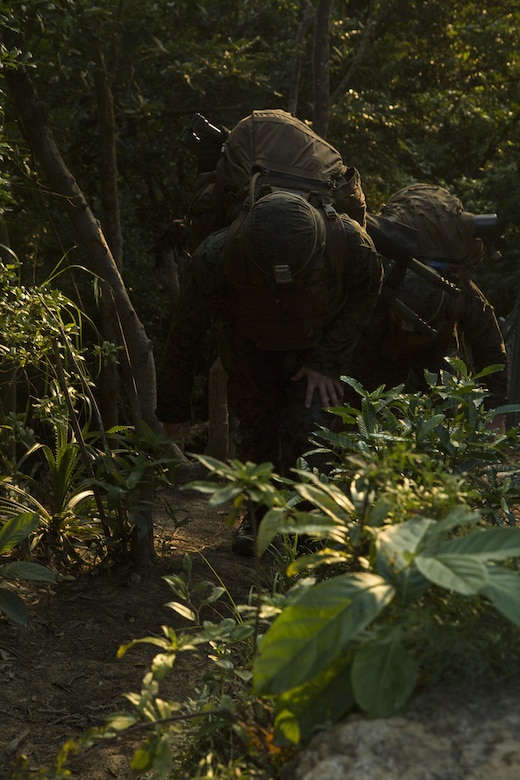 Marines with III Marine Expeditionary Force participated in a culminating event as part of a Marine Corps Martial Arts Program Instructor course July 28, 2016 at Camp Hansen in Okinawa, Japan. The Marines went through a three-week course which challenged them mentally and physically, pushing them past their limits. (U.S. Marine Corps photo by Cpl. Samantha Villarreal/Released)