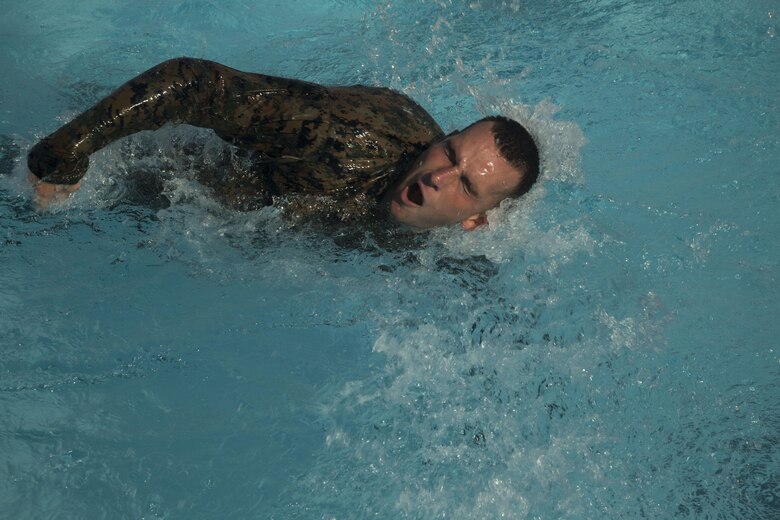 Marines with III Marine Expeditionary Force participated in a culminating event as part of a Marine Corps Martial Arts Program Instructor course July 28, 2016 at Camp Hansen in Okinawa, Japan. The Marines went through a three-week course which challenged them mentally and physically, pushing them past their limits. (U.S. Marine Corps photo by Cpl. Samantha Villarreal/Released)