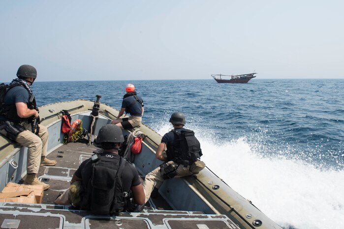 160627-N-VS214-404 ARABIAN GULF (June 27, 2016) The visit, board, search and seizure team from the dock landing ship USS Harpers Ferry (LSD 49) approaches a dhow for a welfare check on the crew. Harpers Ferry is part of the Boxer Amphibious Ready Group and, with the embarked 13th Marine Expeditionary Unit, is deployed in support of maritime security operations and theater security cooperation efforts in the U.S. 5th Fleet area of operations. (U.S. Navy photo by Mass Communication Specialist 3rd Class Zachary Eshleman/Released)   