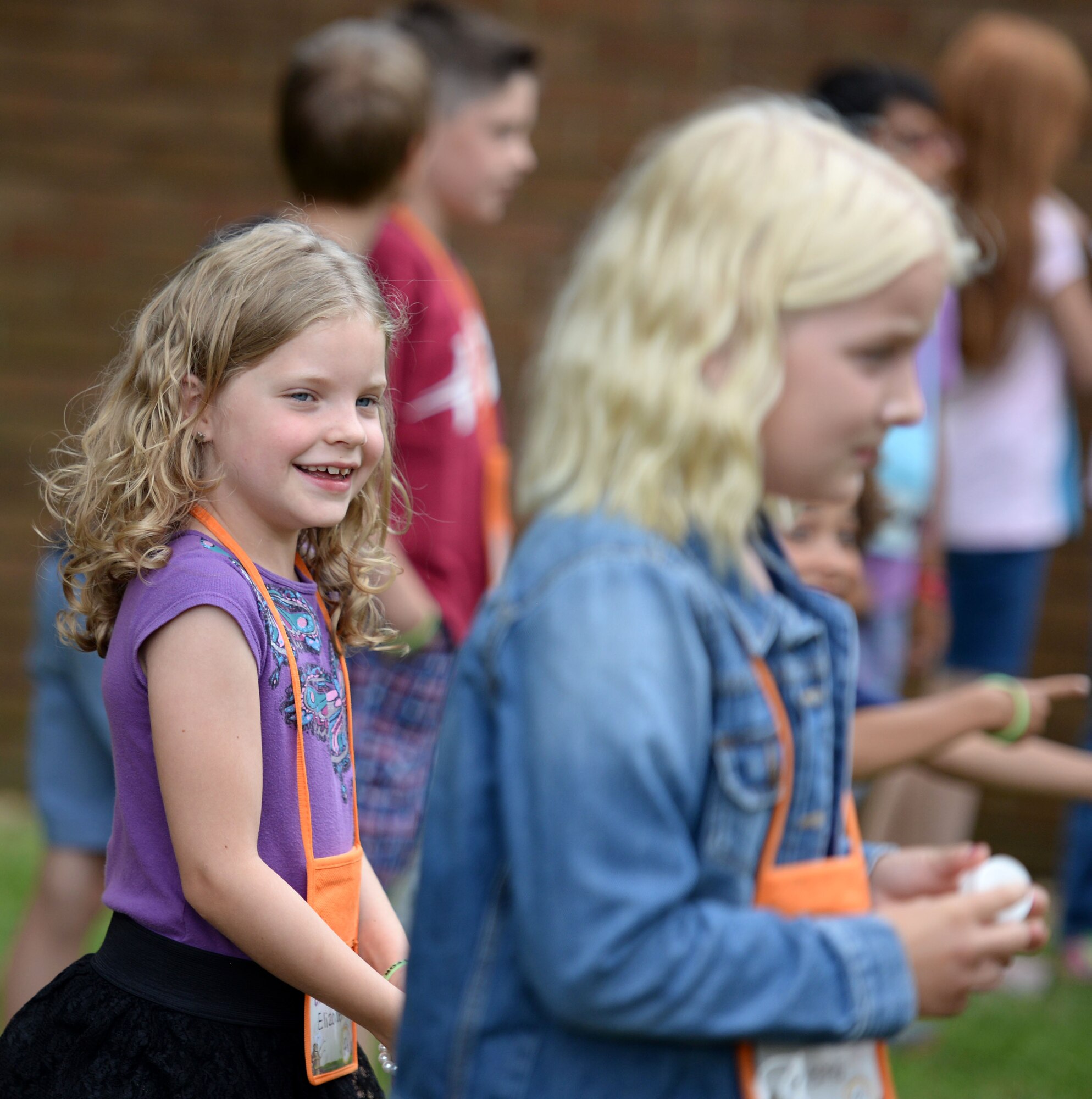 Team Mildenhall children take part in outdoor games during Vacation Bible School July 25, 2016, outside the chapel on RAF Mildenhall, England. This annual event educates children so they can build stronger spiritual foundations. (U.S. Air Force photo by Gina Randall)