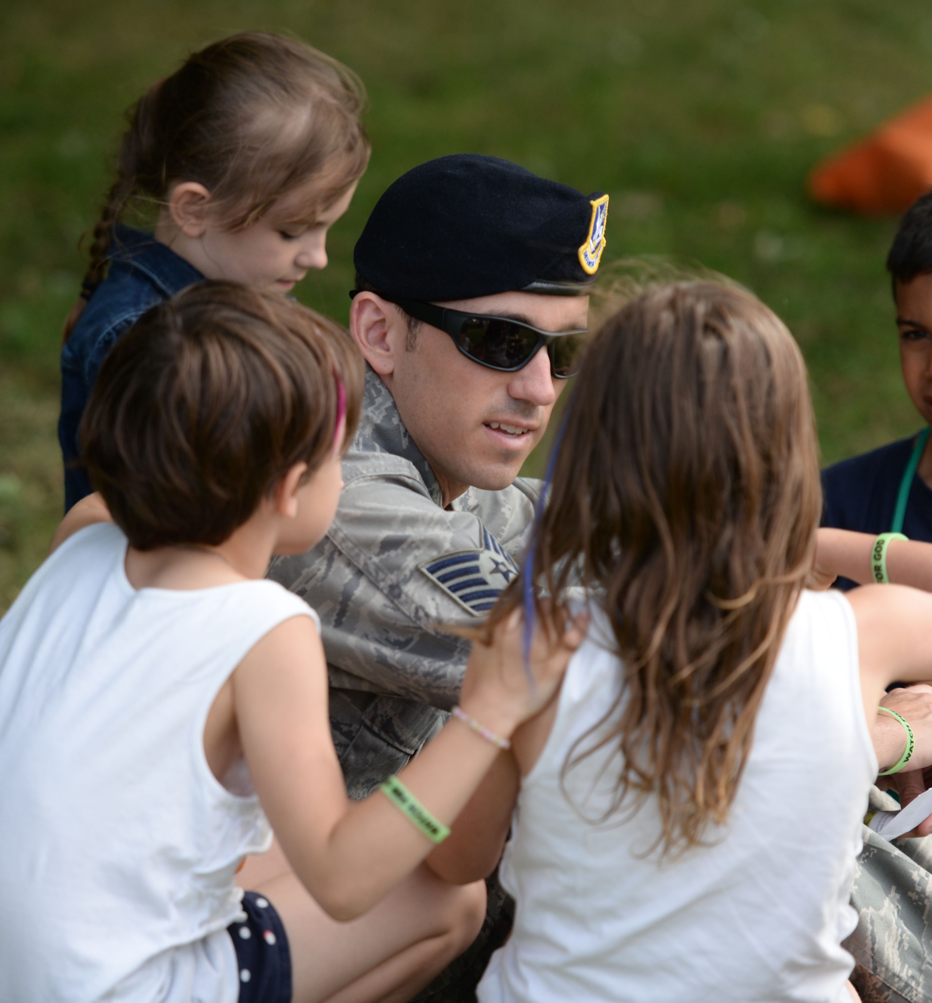 Team Mildenhall children, parents and Airmen take part in outdoor games during Vacation Bible School July 25, 2016, on RAF Mildenhall, England. This annual event is open to all military members and their families from RAF Mildenhall or RAF Lakenheath. (U.S. Air Force photo by Gina Randall)