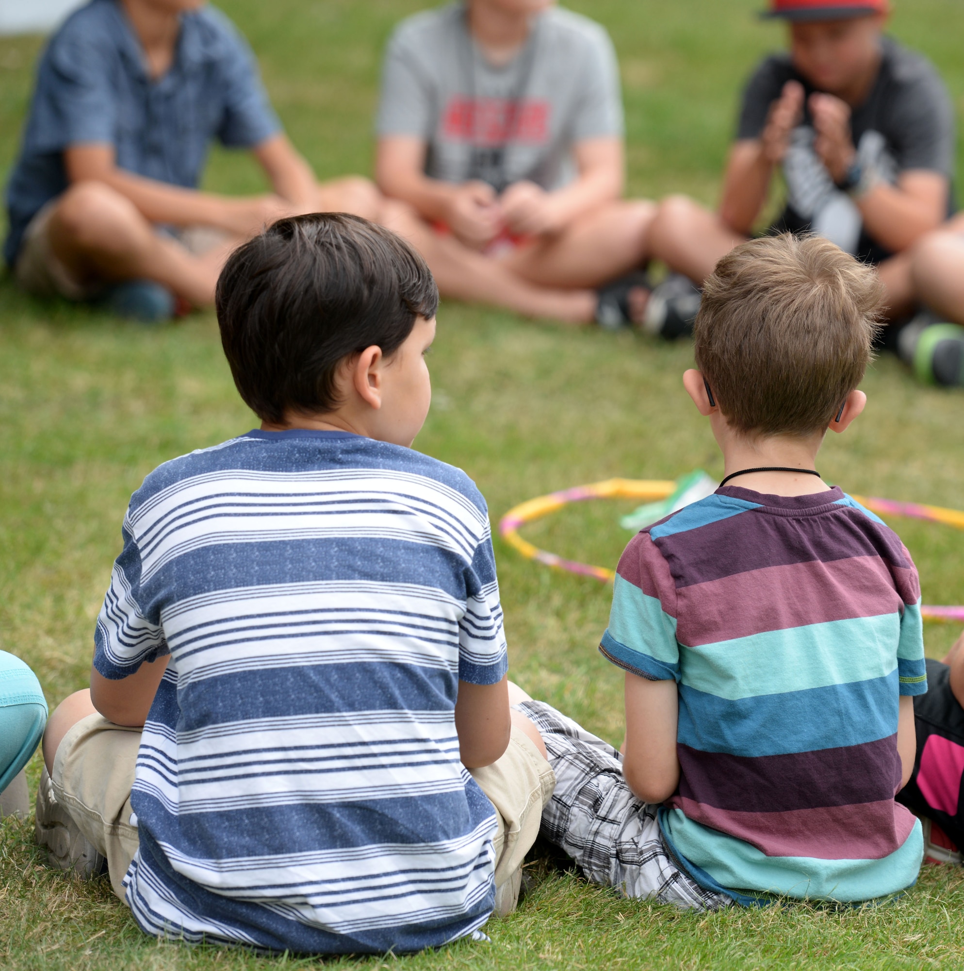Team Mildenhall children take part in outdoor games during Vacation Bible School July 25, 2016, on RAF Mildenhall, England. The children played team-building games to inspire teamwork and cooperation. (U.S. Air Force photo by Gina Randall)