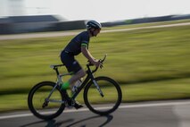 A participant in the 3rd Annual Duathlon competes in the bike portion of the race July 23, 2016, on RAF Mildenhall, England. The duathlon is one of several events the RAF Mildenhall Fitness Center hosts as a way to promote fitness and boost base-wide camaraderie. (U.S. Air Force photo by Senior Airman Christine Halan)