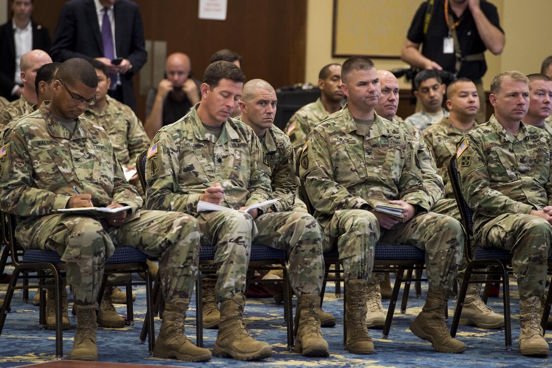 Deploying troops listen as Defense Secretary Ash Carter speaks to them during his visit to Fort Bragg, N.C., July 27, 2016. DoD photo by Air Force Tech. Sgt. Brigitte N. Brantley