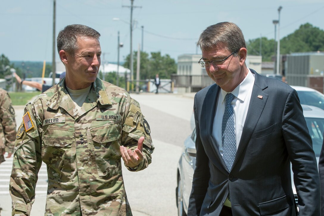 Defense Secretary Ash Carter, right, talks with Army Lt. Gen. Austin Miller, commander of Joint Special Operations Command, during a visit to Fort Bragg, N.C., July 27, 2016. DoD photo by Air Force Tech. Sgt. Brigitte N. Brantley