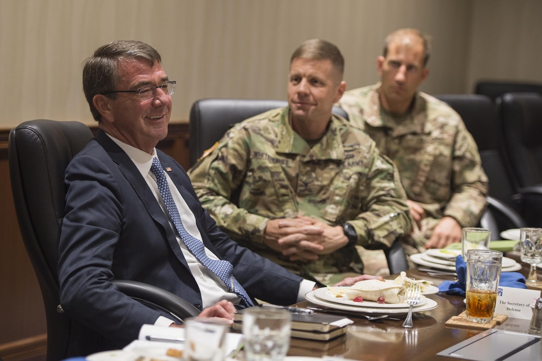 Defense Secretary Ash Carter, left, meets with deploying soldiers during a visit to Fort Bragg, N.C., July 27, 2016. DoD photo by Air Force Tech. Sgt. Brigitte N. Brantley