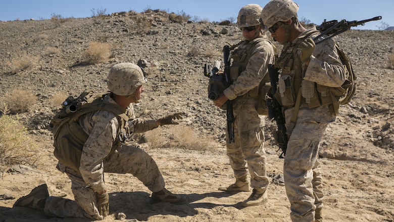 Cpl. Shane Martin, team leader, 3rd Battalion, 4th Marine Regiment, briefs the members of his fire team as part of Tactical Small-Unit Leadership Course at Marine Corps Air Ground Combat Center, Twentynine Palms, California, July 18, 2016. The purpose of the course was to focus on the training of small-unit leadership within “Darkside.”