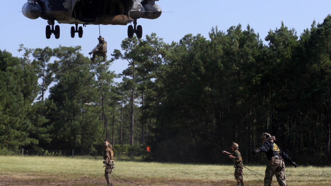 Marines with U.S. Marine Corps Forces Special Operations Command conduct a fast rope and rappelling course on Landing Zone Parrot at Marine Corps Base Camp Lejeune, N.C., July 20, 2016. The exercise was part of a two weeklong Helicopter Insertion and Extraction Techniques Course. The CH-53 provided for the training evolution was assigned to Marine Heavy Helicopter Squadron 461, 2nd Marine Aircraft Wing. 