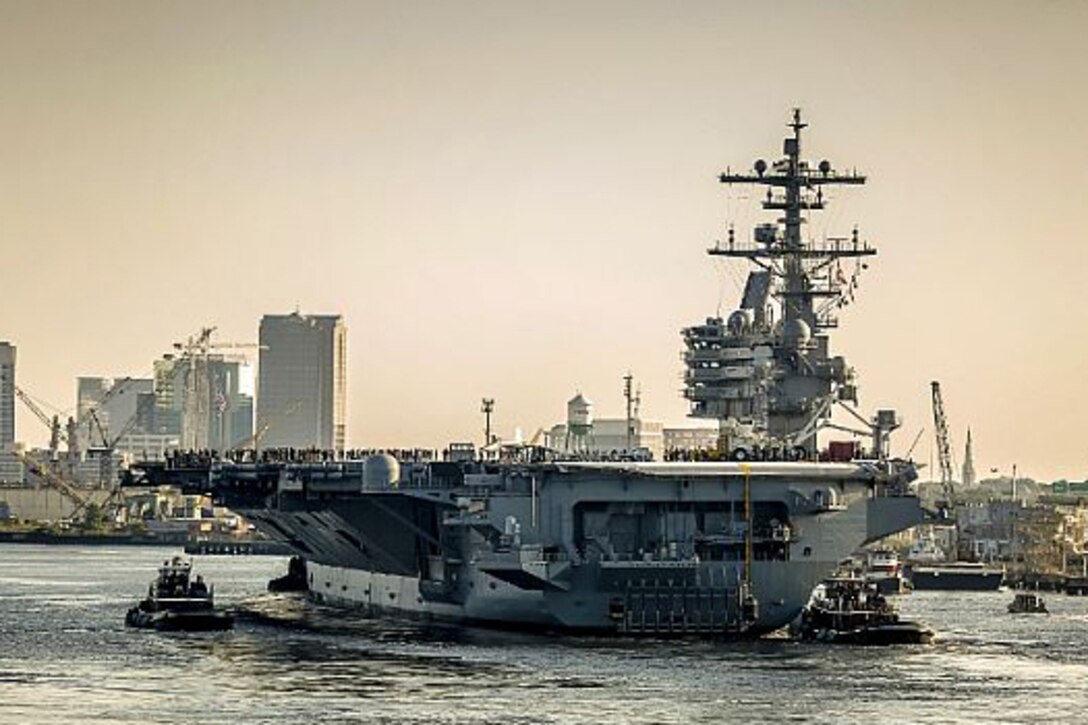 The aircraft carrier USS George H.W. Bush departs Norfolk Naval Shipyard in Virginia for sea trials, July 23, 2016.  The carrier has been at the shipyard since June 16, 2015, for maintenance work, including upgrades to its close-in weapons system. Navy photo by Shayne Hensley