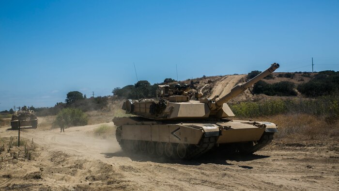 Marines with Company A., 4th Tank Battalion, 4th Marine Division, Marine Forces Reserve, return from patrolling in M1A1 Abrams Main Battle Tanks during their annual training at Marine Corps Base Camp Pendleton, Calif., July 17, 2016. The annual training exercise displayed the Marines ability to execute heavily armored, large scale attacks while working with their active duty counterparts.