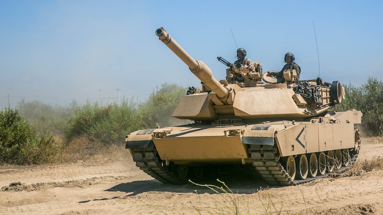 Marines with Company A, 4th Tank Battalion, 4th Marine Division, Marine Forces Reserve, return from patrolling in M1A1 Abrams Main Battle Tanks during their annual training at Marine Corps Base Camp Pendleton, Calif., July 17, 2016. The annual training exercise displayed the Marines ability to execute heavily armored, large scale attacks while working with their active duty counterparts.