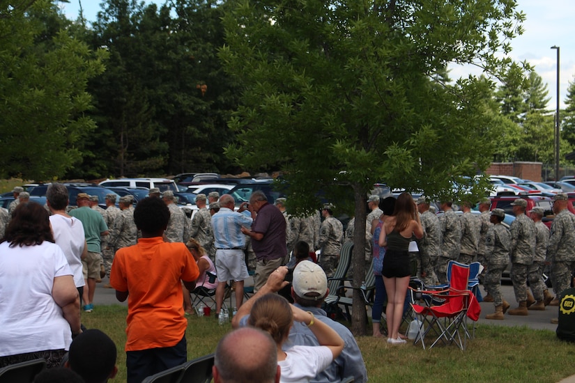 U.S. Army Reserve Soldiers of the 456th Area Support Medical Company (ASMC) march up to their deployment ceremony in Somersworth, N.H. on July 16, 2016 as family members and friends stand to get a better view.  The 456th ASMC are preparing to deploy overseas for nine months to provide at any time up to 72 hours of emergency care and stabilization medical support. (U.S. Army photo by Capt. Charles An/released)